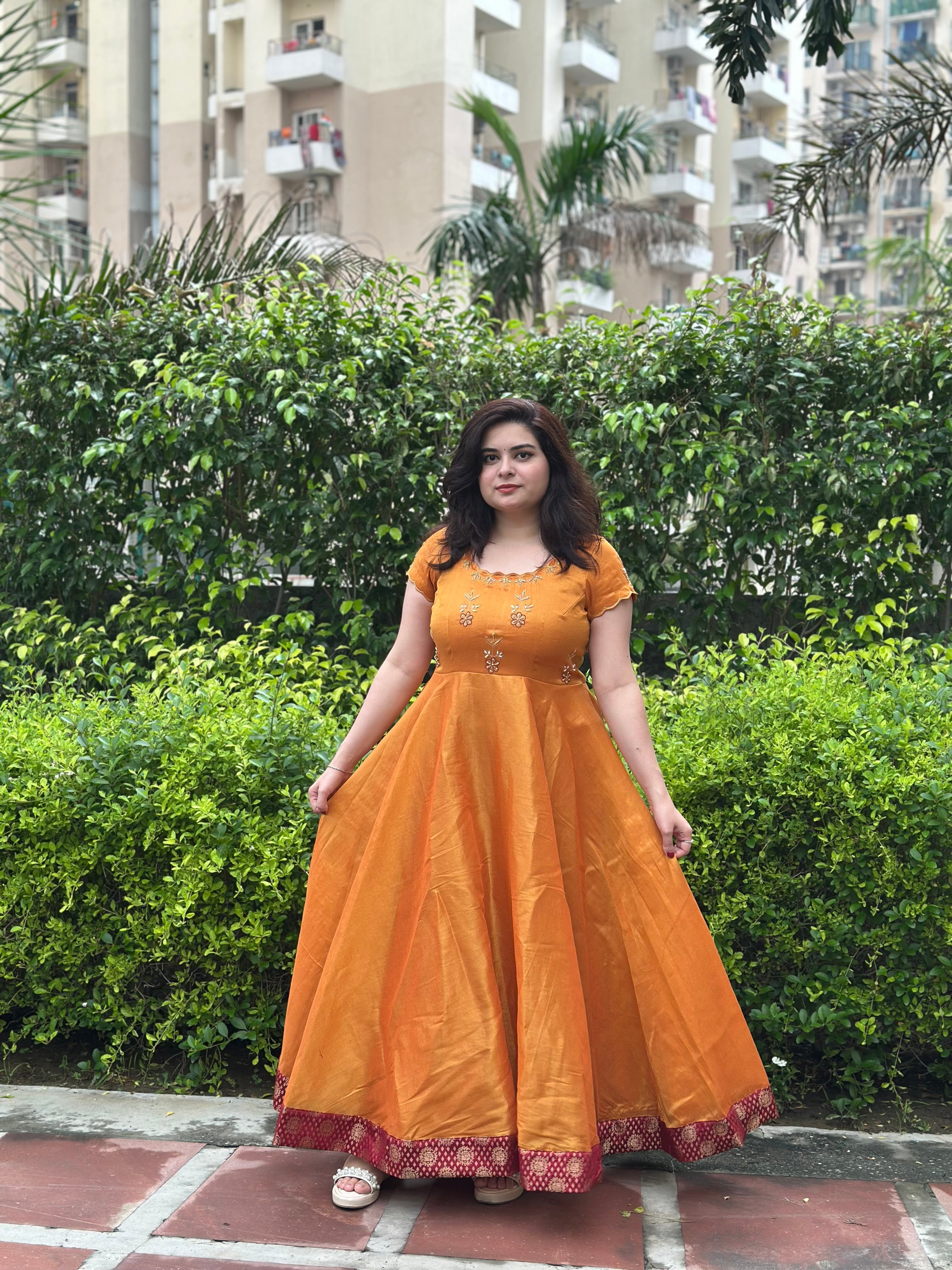 Hand embroidered mustard silk tissue anarkali with maroon brocade border