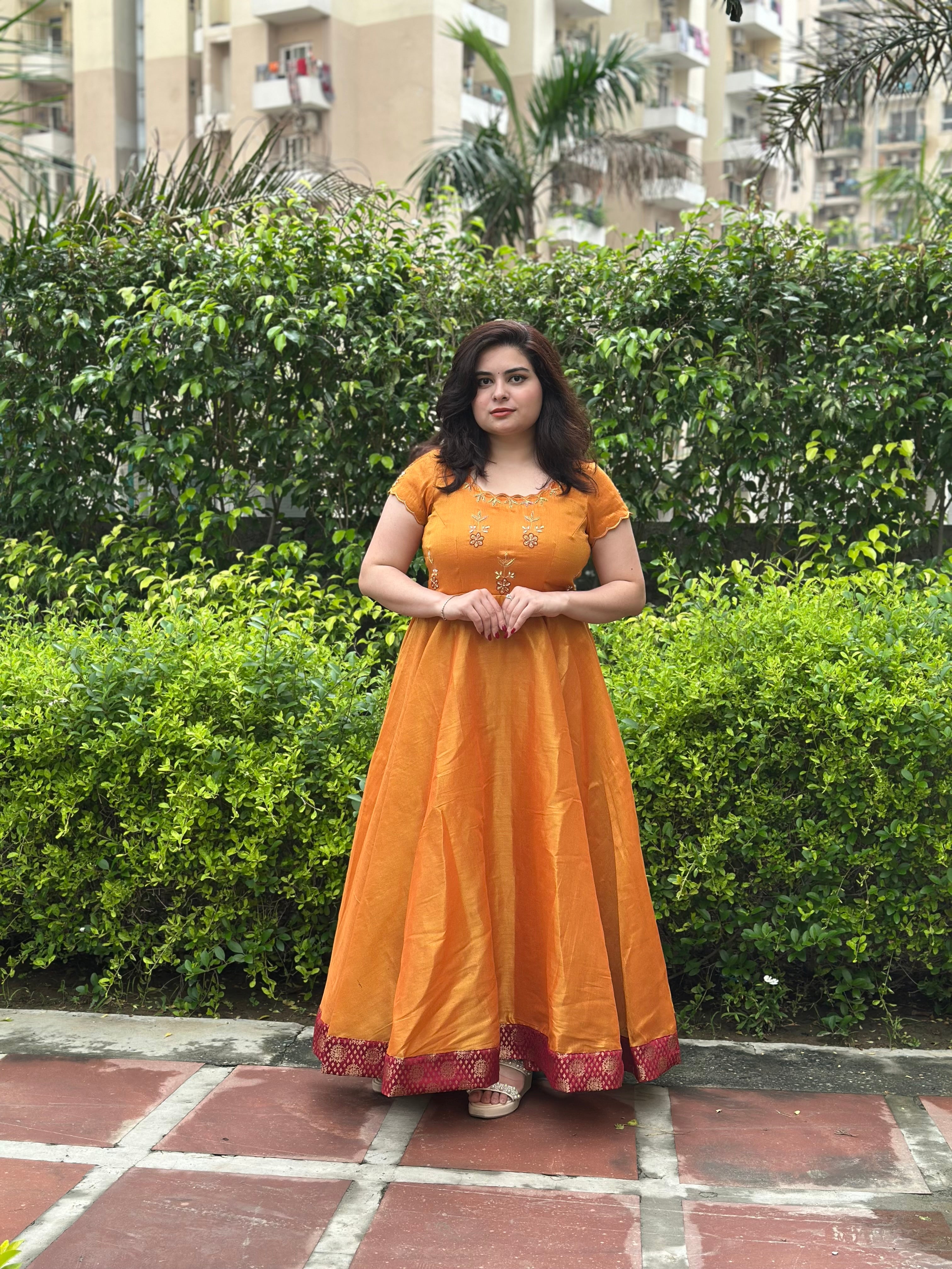 Hand embroidered mustard silk tissue anarkali with maroon brocade border