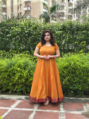 Hand embroidered mustard silk tissue anarkali with maroon brocade border