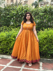 Hand embroidered mustard silk tissue anarkali with maroon brocade border